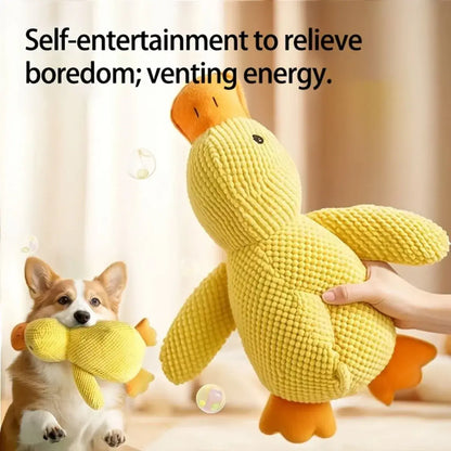 Yellow plush duck toy with a dog holding it, text about self-entertainment.
